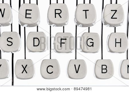 keyboard letters and an old typewriter. symbolic photo for communication in former times