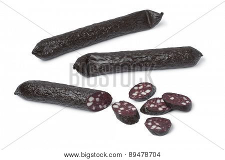 Traditional German black pudding sausage and slices on white background