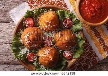 Arancini Rice Balls And Tomato Sauce Closeup. Horizontal Top View
