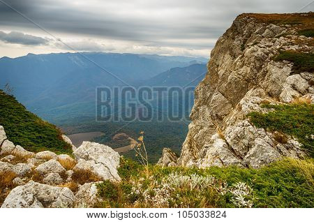 View From The Mountain Forest In A Cloudy Day