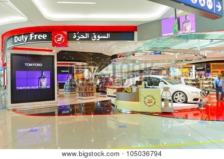 DUBAI, UAE - APRIL 18, 2014: the interior of Concourse A. The concourse includes one 4 star hotel and one 5 star hotel, first and business class lounges, and duty-free areas