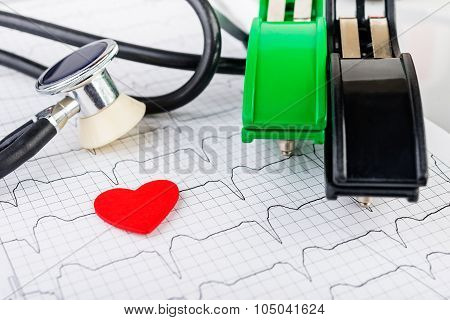ECG electrodes  on the background of the electrocardiogram