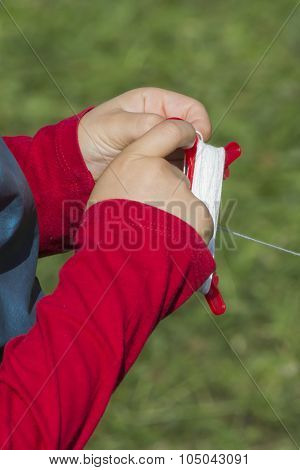 Little Girl Playing With A Kite