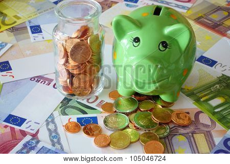 Saving Money In A Piggy Bank