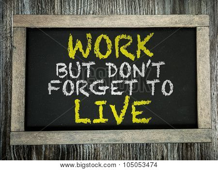 Work But Don't Forget to Live written on chalkboard