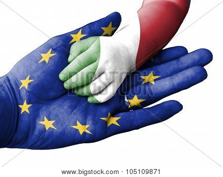 Adult Man Holding A Baby Hand With European Union And Italy Flags Overlaid. Isolated On White