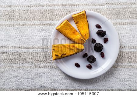 Baked Pumpkin On White Plate
