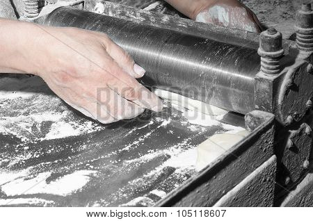 Baker Making Dough On Sheeter