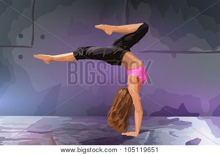 Young woman dancer. On wall background.