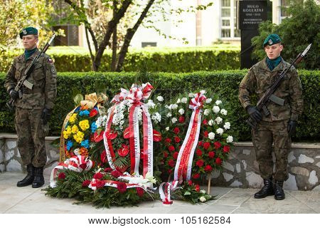 KRAKOW, POLAND - MAY 3, 2015: Polish soldiers at ceremony of laying flowers to monument to Hugo Kollataj during annual Polish national and public holiday the May 3rd Constitution Day (of May 3, 1791)