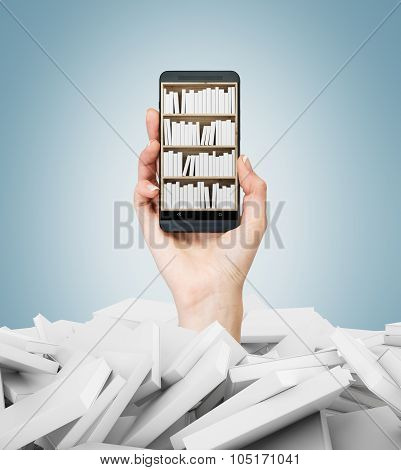 A Hand Holds A Smartphone With A Book Shelf On The Screen. A Heap Of Books With White Covers. A Conc