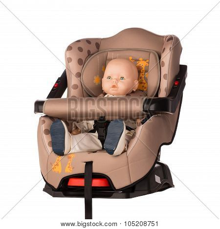 Baby doll in a booster seat for a car