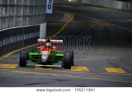 KUALA LUMPUR, MALAYSIA - AUGUST 09, 2015: William Lok in a single seater racing car race in the city street circuit in the Formula Masters China Series Race at the 2015 Kuala Lumpur City Grand Prix.