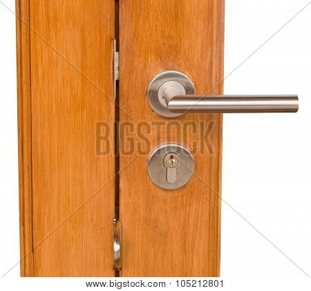 Lock And Door Handle On Golden Brown Wooden Door