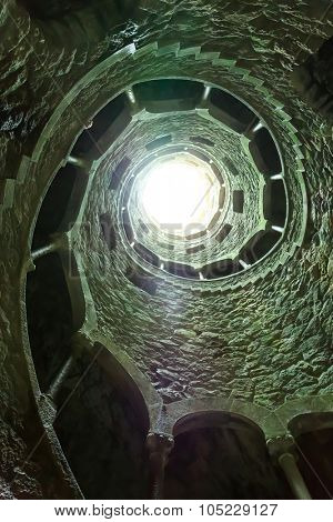 Light in the end of the spiral stairs. Toned image