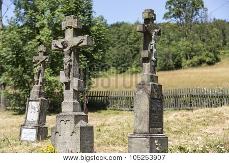 Old abandoned stony Orthodox crosses in Regietow, Poland