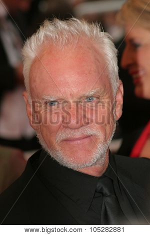CANNES, FRANCE - MAY 25: Actor Malcolm McDowell arrives at the premiere for the film 'We Own The Night' at the Palais  during the 60th  Cannes Film Festival on May 25, 2007 in Cannes, France.