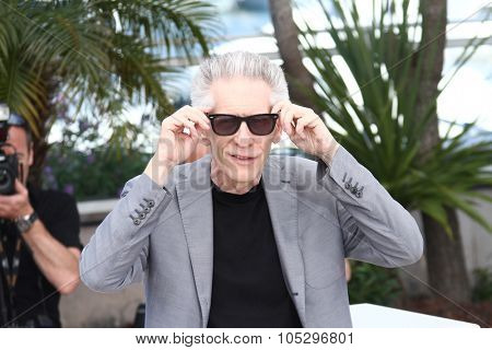 CANNES, FRANCE - MAY 25: Director David Cronenberg poses at the 'Cosmopolis' photocall during the 65th Annual Cannes Film Festival at Palais des Festivals on May 25, 2012 in Cannes, France.