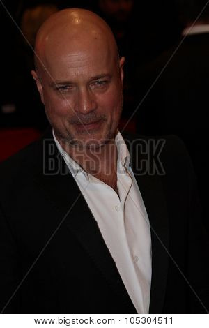 BERLIN, GERMANY - FEBRUARY 06: Christian Berkel    attends 'The Grand Budapest Hotel' Premiere during the 64th Berlinale Film Festival at Palast on February 6, 2014 in Berlin, Germany