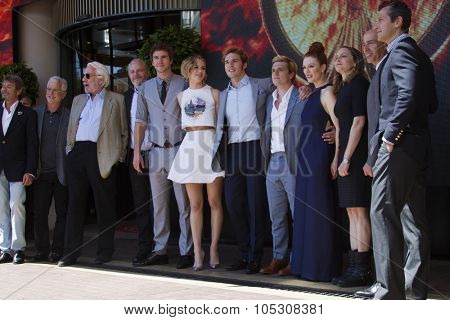 CANNES, FRANCE - MAY 17:  Liam Hemsworth, Jennifer Lawrence, Sam Claflin,   attend 'The Hunger Games: Mockingjay Part 1' Photocall - at the 67th  Cannes Film Festival on May 17, 2014 in Cannes, France