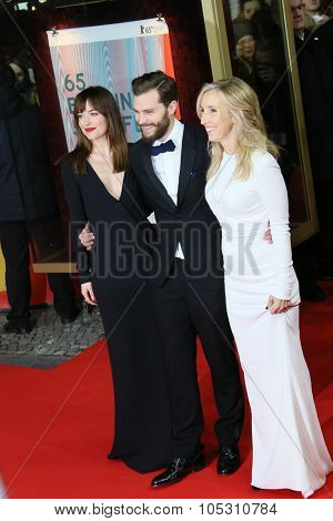 BERLIN, GERMANY - FEBRUARY 11: Jamie Dornan,  Dakota Johnson attend the 'Fifty Shades of Grey' premiere during the 65th Berlinale Film Festival at Zoo Palast on February 11, 2015 in Berlin, Germany.