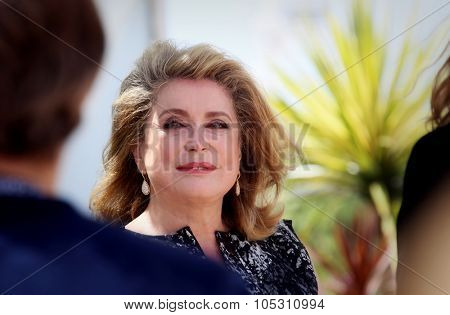 CANNES, FRANCE - MAY 21: Actress Catherine Deneuve attends 'L'Homme Qu'On Aimait Trop' photocall at the 67th Annual Cannes Film Festival on May 21, 2014 in Cannes, France.