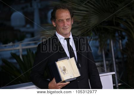 Vincent Lindon attends a photocall for the winners of the Palm D'Or during the 68th annual Cannes Film Festival on May 24, 2015 in Cannes, France.