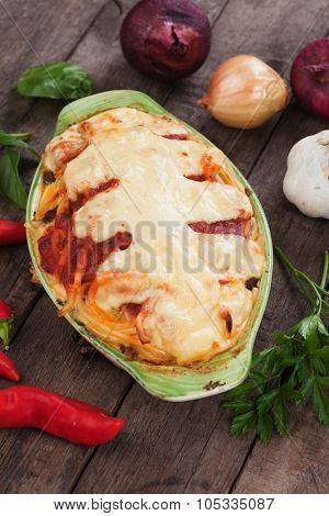 Pasticcio or pastitsio with zucchini and cheese, italian baked pasta