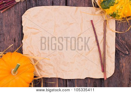 Pumpkins On A Wooden Table