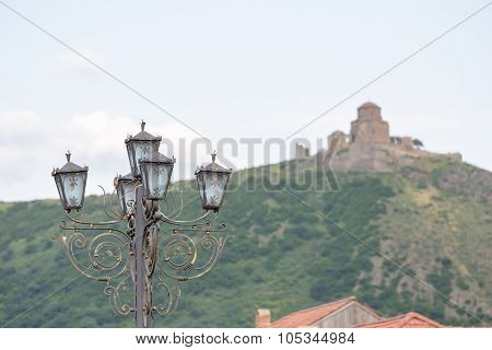 Street Lamp With Jvari Monastery At The Background