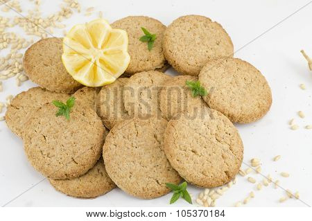 Integral Cookies And Decorated Lemon On White Background