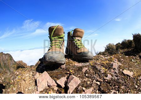 Hiking Boots On Beautiful Mountain Peak