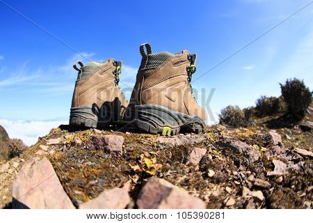 Hiking Boots On Beautiful Mountain Peak