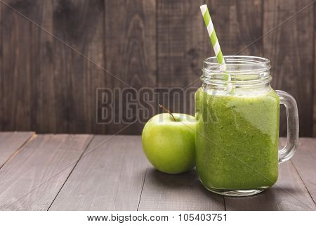 Healthy Green Vegetables And Green Fruit Smoothie On Rustic Wood Table