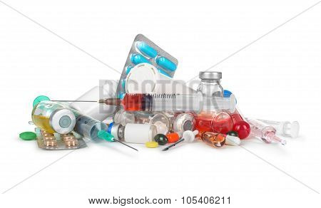 Heap Of Medical Syringes, Bottles, Pills, Ampules Isolated On White