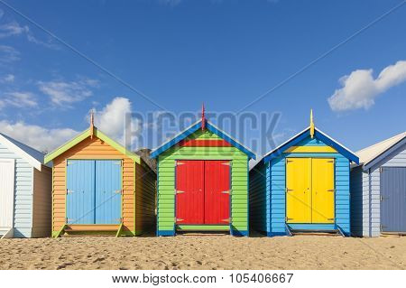 Bathing boxes in a beach with copyspace