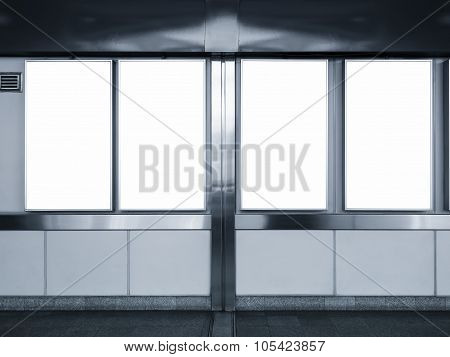 Mock Up Vertical Ad Four Poster Sign Display In Subway Station