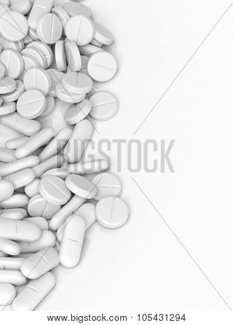 White tablets and caplets, isolated on white background.