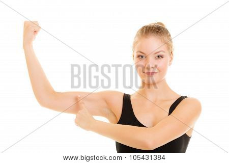 Fitness Woman Showing Energy Flexing Biceps Muscles.