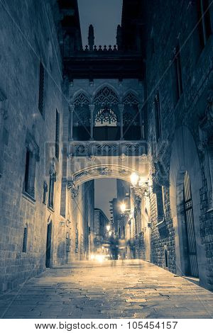 Narrow street in Gothic quarter with lanterns light, Barcelona, Spain, Europe