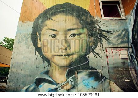 Graffiti with poor girl face,