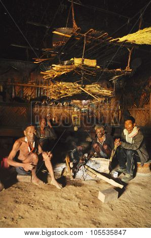 Men Around Fire In Nagaland, India