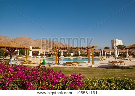 The swimming pool is at the hotel