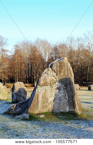 The Big Stones Standing In The Snow Field In Winter