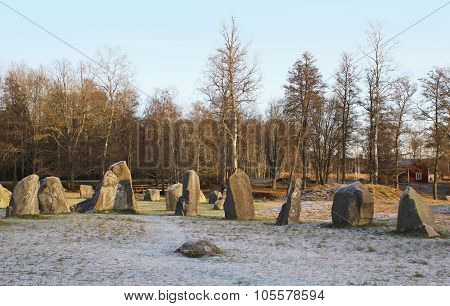 The Big Stones Standing In The Snow Field In Winter