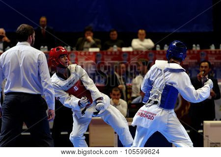 ST. PETERSBURG, RUSSIA - OCTOBER 17, 2015: Taekwondo WTF junior teams match Russia vs Iran during the martial arts festival Baltic Sea Cup in Sibur Arena. Iran won the match