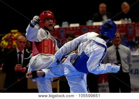 ST. PETERSBURG, RUSSIA - OCTOBER 17, 2015: Taekwondo WTF junior teams match Russia vs Iran during the martial arts festival Baltic Sea Cup in Sibur Arena. Iran won the match