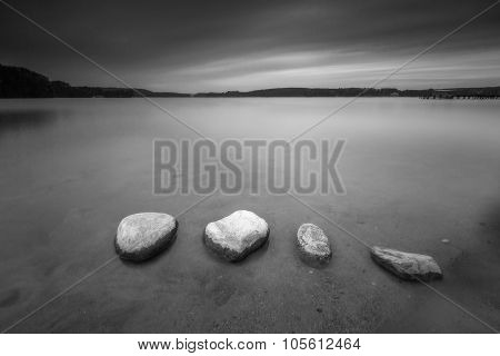 Long Exposure Landscape Of Lake Shore