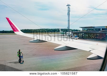 Wizzair plane at the gate, view from airplane window. Oslo, Norw