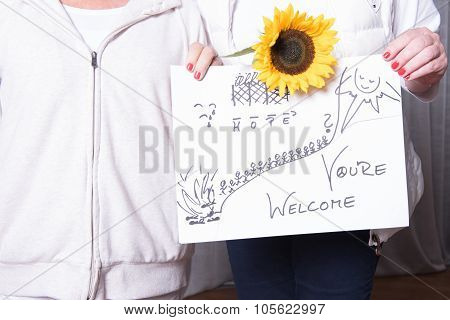 Female Helpers Welcome Refugees